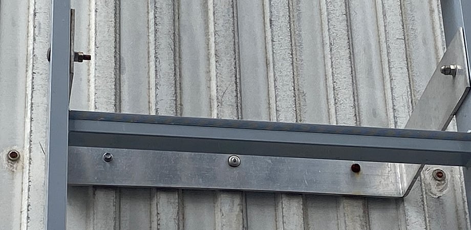 Ladder fixtures that are incorrect (rivets, instead of screws) and showing signs of corrosion.